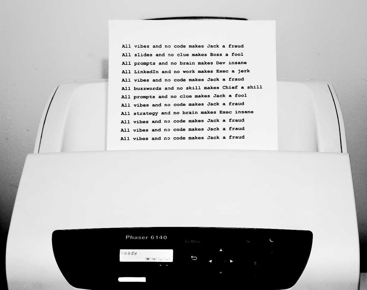 Printer with paper showing repeated text: All vibes and no code makes Jack a fraud